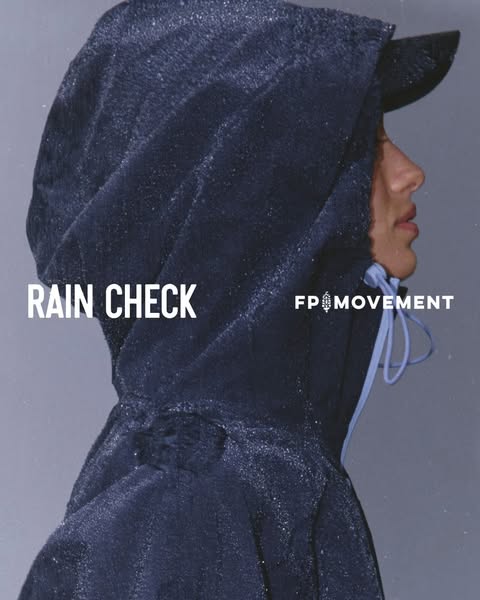 This ad for FP Movement features a close-up shot of a person wearing a rain jacket with a hood. The ad emphasizes the ja