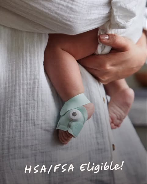 This ad features a baby wearing a Owlet Dream Sock. The ad highlights that the product is HSA/FSA eligible.