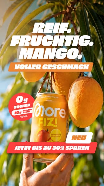 This image ad shows a can of More Fiz! Mango drink in front of a mango tree. The ad emphasizes the drink's mango fla