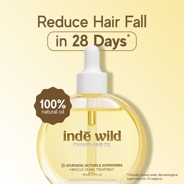 This ad for Inde Wild Champi Hair Oil focuses on the benefit of hair fall reduction in 28 days. The ad emphasizes the na