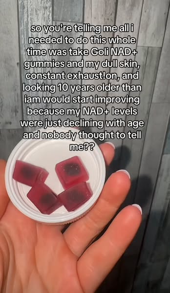 The ad shows a hand holding a bottle cap full of Goli NAD+ gummies, with the text overlay expressing surprise and relief
