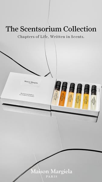 This ad showcases the Maison Margiela 'The Scentsorium Collection', highlighting the product's packaging, de