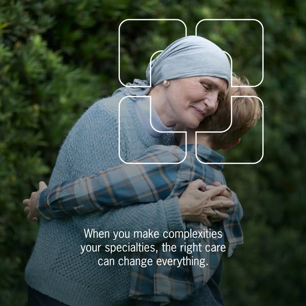 This image ad features an older woman with a head covering embracing a child. The image is overlaid with a graphic eleme