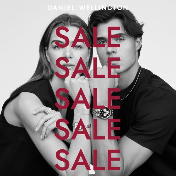 A black and white image ad for Daniel Wellington featuring a man and woman modeling various watches and bracelets with t