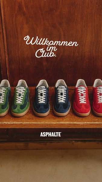 This ad features a row of five ASPhALTE Club sneakers in different colors against a dark wooden backdrop. The headline, 