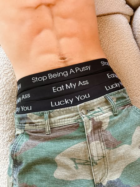 This ad is a product-focused ad for men's underwear with cheeky slogans on the elastic waistband. The ad features a 