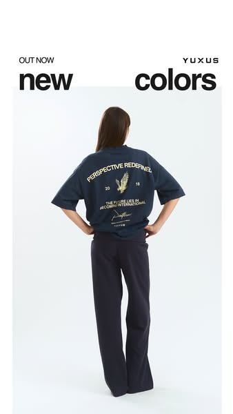 This is an ad for YUXUS new colors collection, featuring a person wearing a YUXUS t-shirt with print on the back.