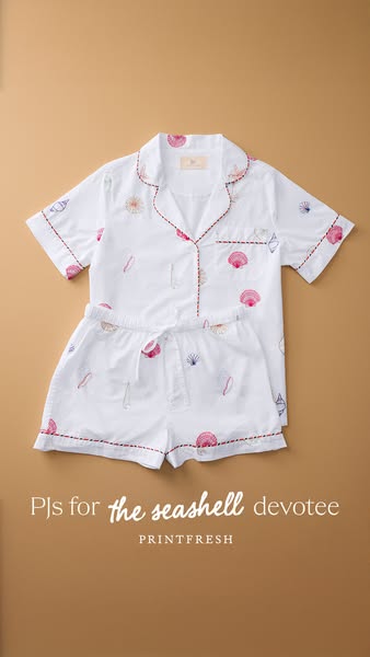 This image ad showcases a set of white pajamas with a seashell pattern. The ad targets individuals who love the beach an