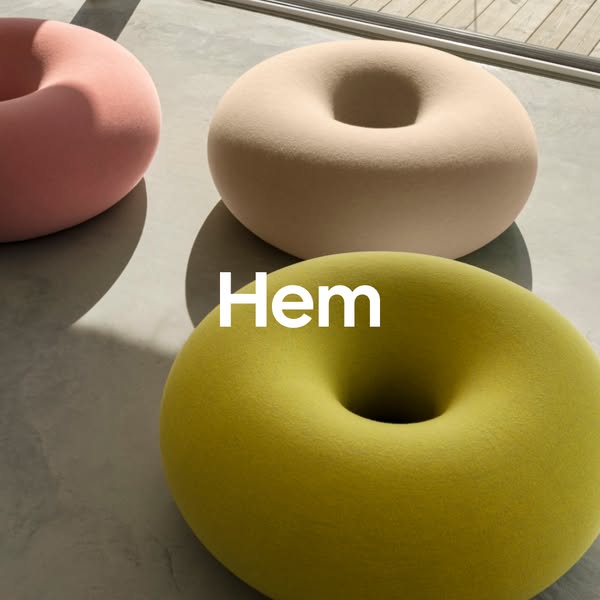 An image ad for Hem featuring three donut stools in different colors and with a white logo.