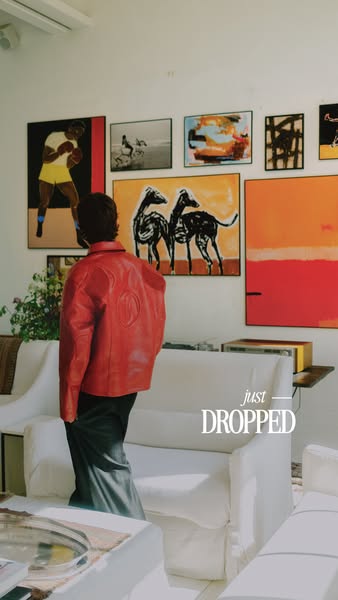 This ad features a person in a red jacket. The ad is to showcase clothing that has recently dropped.