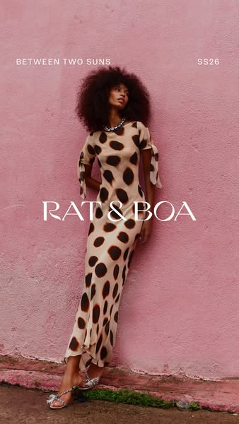 A still image ad for Rat & Boa, featuring a model wearing the brands’s maxi dress with a brown polka-dot print leani