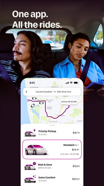 This ad shows two passengers riding in a car while displaying a Lyft app interface on a phone in the center of the frame