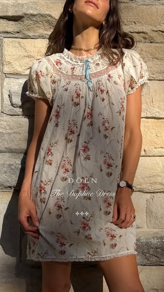 The ad features a woman wearing a floral dress. The ad calls out the brand name and style of dress.