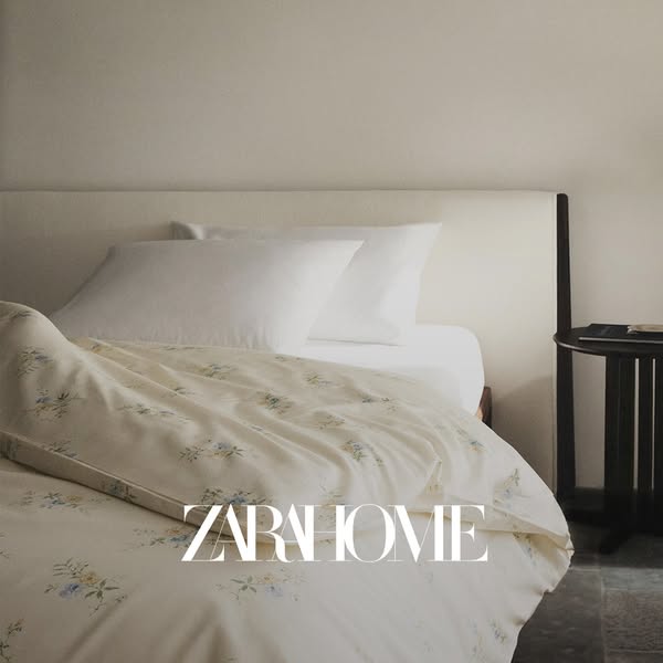 This Zara Home ad features a bed with Zara Home bedding. The ad conveys a sense of calm and relaxation with its neutral 