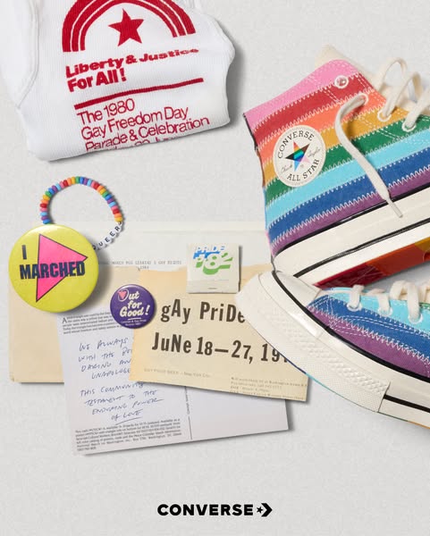 This image ad for Converse features the brand's pride collection. The image is full of products and memorabilia rela