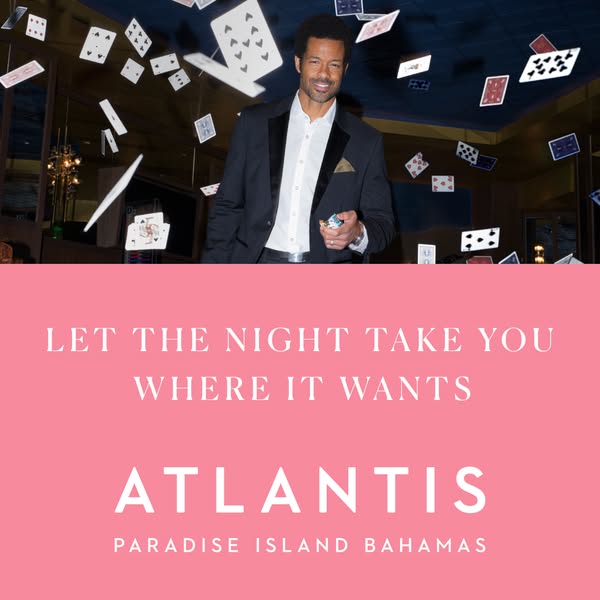 This image ad for Atlantis Paradise Island Bahamas features a photo of a man in a suit with playing cards floating aroun