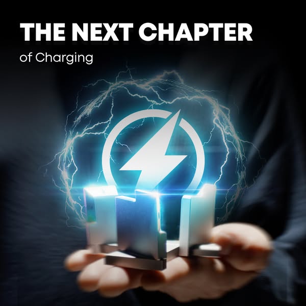 The ad features a sleek, modern charger held in someone's hand against a dark background. The headline proclaims &qu