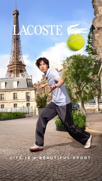 A photo of a man, who appears to be an athlete, on a picturesque street in Paris with the Eiffel Tower in the background