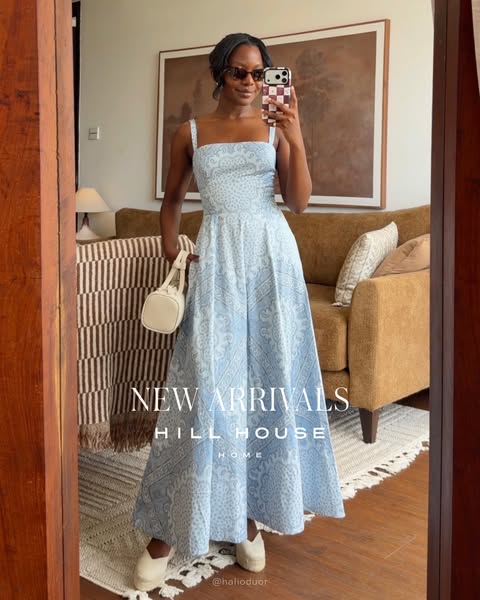 This image promotes a Hill House dress in a casual setting, highlighting its style and everyday appeal.