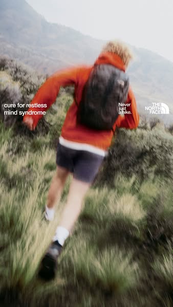 This ad by The North Face promotes hiking as a way to alleviate a restless mind. It shows a person in activewear hiking 