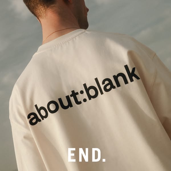 An image showcases the back of a t-shirt worn by an individual facing away from the camera. The t-shirt features the bra
