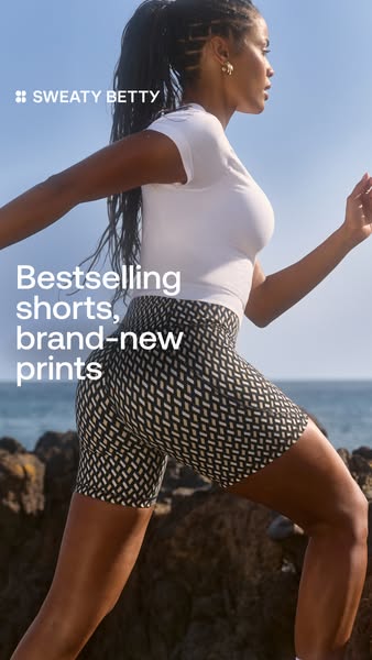 An image showcasing a model wearing Sweaty Betty bestselling shorts with brand-new prints. This ad emphasizes the brand&