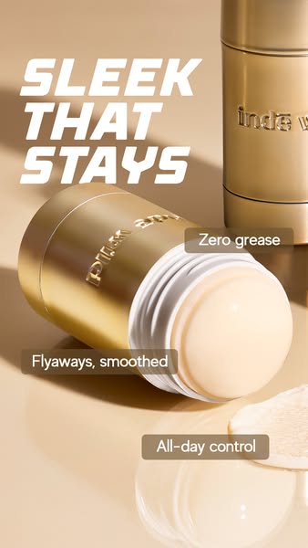 An image ad promoting a hair smoothing stick that smooths flyaways with all-day control and zero grease.