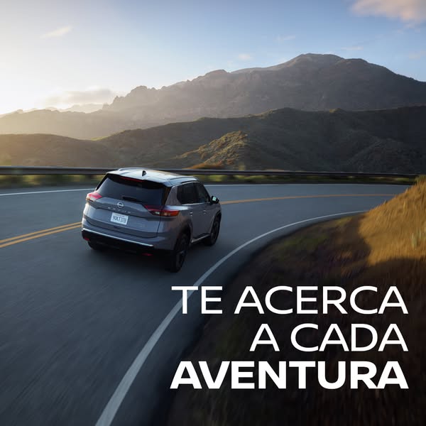 This image ad features a Nissan Rogue driving along a road in the mountains. The ad is designed to convey a sense of adv