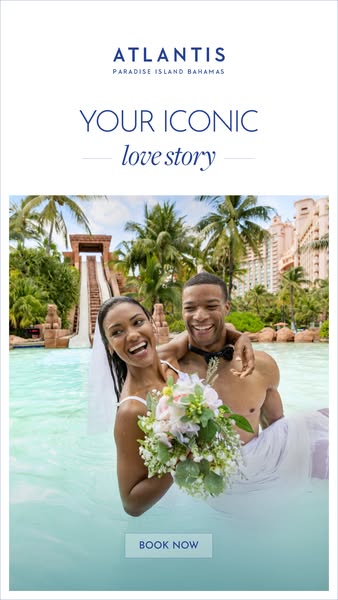 This ad for Atlantis Paradise Island Bahamas features a bride and groom standing in the water with the resort in the bac