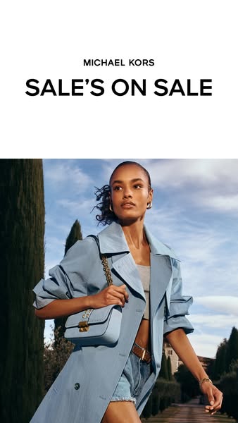 This ad by Michael Kors promotes a sale and features a light blue handbag with a gold chain.