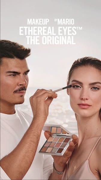 Makeup by Mario is advertising their Ethereal Eyes eyeshadow palette. A makeup artist is applying eyeshadow to a model a