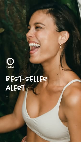 This image ad for PAKA features a young woman smiling in a low-cut athletic bra and emphasizes that the brand's prod