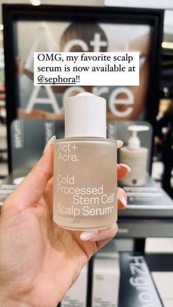 This ad features a person holding Act + Acre Cold Processed Stem Cell Scalp Serum in a store with a background display f