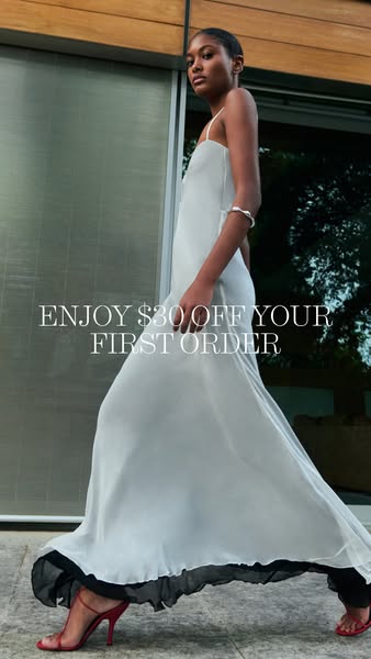 This image ad promotes a brand by offering $30 off the first order. The ad features a woman wearing a long white dress w