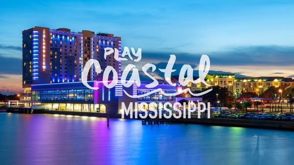 This ad is for Island View Casino Resort. It uses a daytime photo of the resort and encourages people to come play in Co