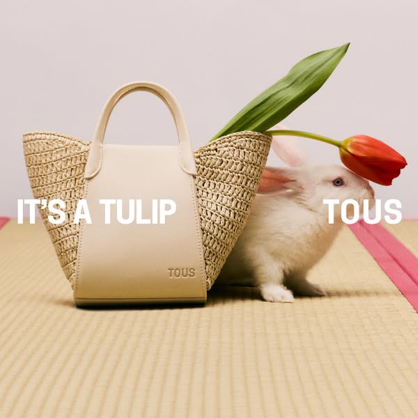 This image ad shows a purse next to a bunny and a tulip.