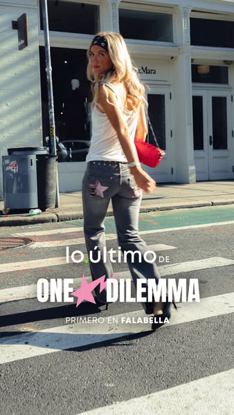 This image ad promotes One Dilemma, a brand available at Falabella. It features a model walking across a crosswalk, show