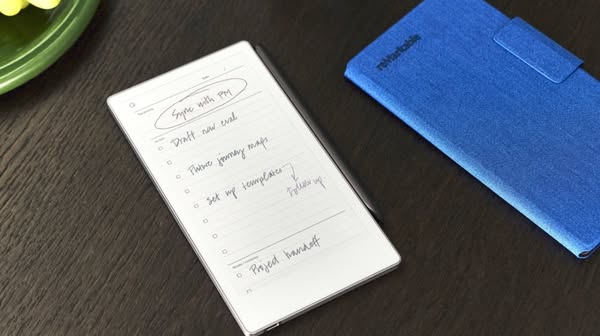 This image ad showcases the Remarkable 2 paper tablet being used for project management. The ad shows a close-up of the 