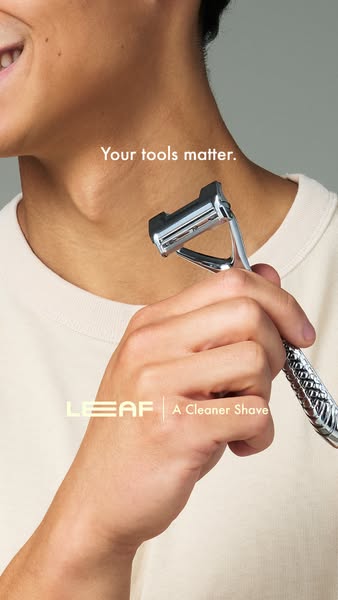 The ad features an image of a person holding a Leaf razor, emphasizing the importance of using quality tools for shaving