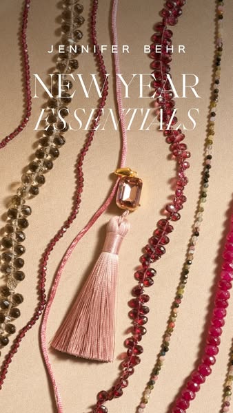 This ad showcases Jennifer Behr's New Year Essentials collection, featuring a variety of beaded necklaces and a tass