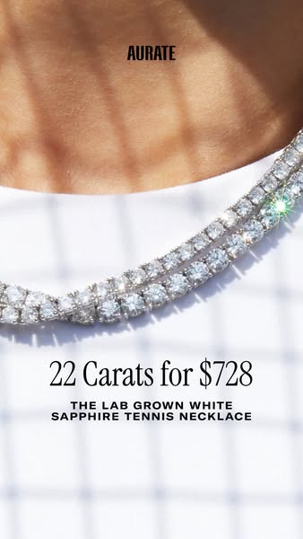 This ad showcases a close-up of a lab-grown white sapphire tennis necklace from Aurate, highlighting its carat size and 
