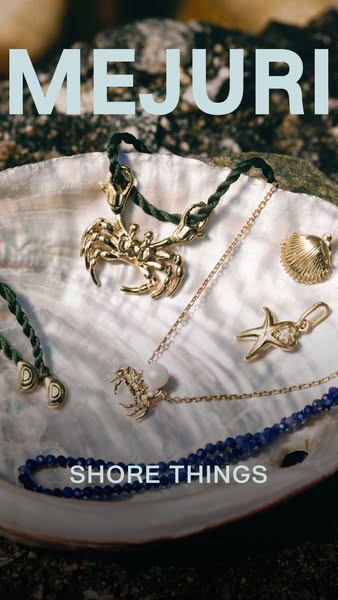 This ad showcases jewelry, including necklaces and bracelets. The jewelry is beach themed with a crab, starfish and seas