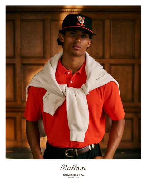 This image ad from Malbon promotes its Summer 2026 line of apparel with a photo of a man in a polo shirt and branded hat