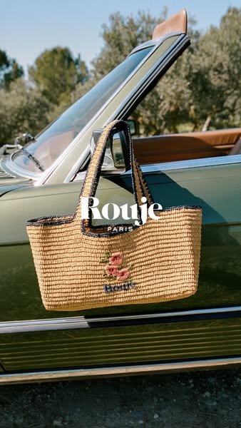 This ad showcases a straw bag from the brand Rouje. The bag is presented as a stylish accessory, subtly implying a lifes
