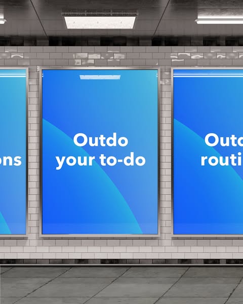 This ad shows three billboards in a subway station with the text "Outdo your to-do" and "Outdo your routi