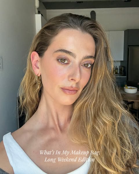 This ad features a selfie-style shot of a woman with long hair and makeup, promoting her favorite beauty products for a 