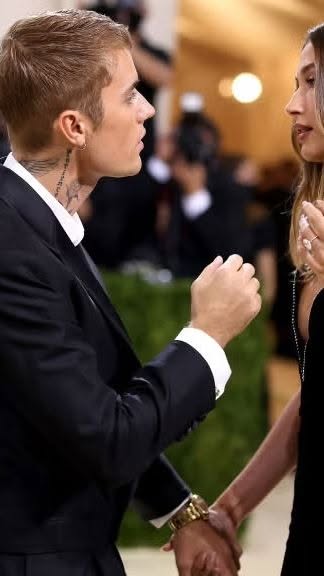 This ad features an image of Justin and Hailey Bieber.
