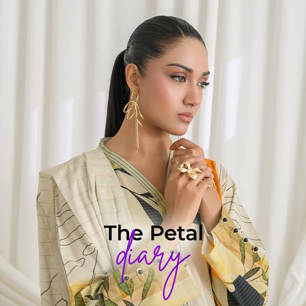 The ad features a woman modeling gold earrings and a ring from The Petal Diary collection.