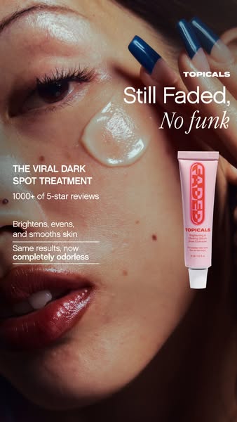 This image ad for Topicals' Faded serum uses a close up shot of a woman's face with the product applied to her c