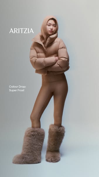 This ad showcases Aritzia's new 'Super Frost' color drop, featuring a model wearing a puffer jacket, legging
